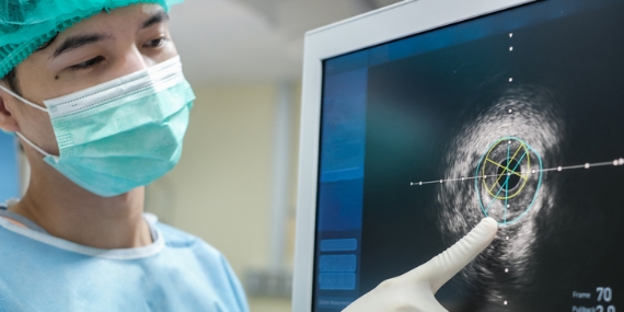 Surgeon analysing a scan Surgeon analysing a scan