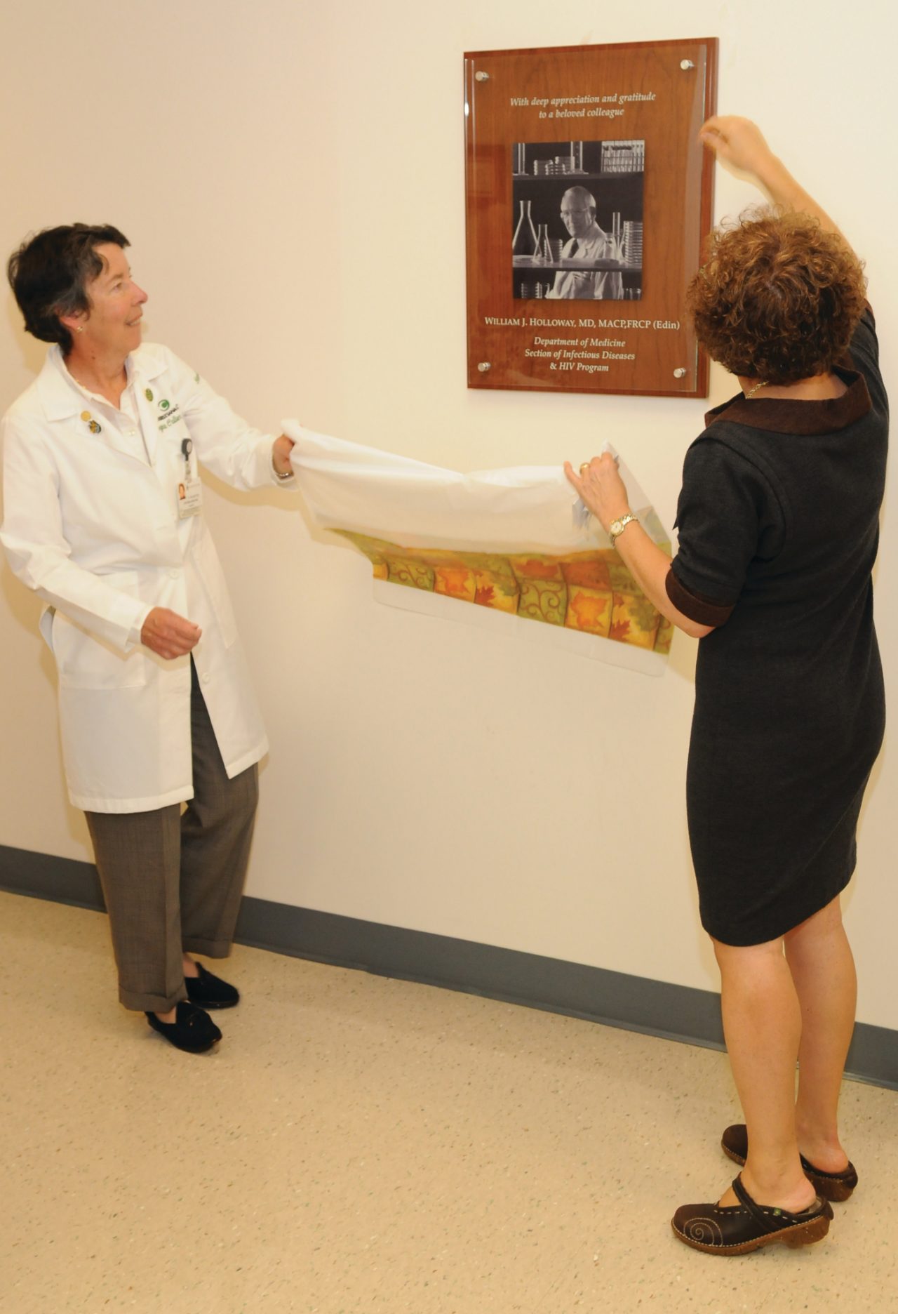 A plaque is unveiled honoring Dr. William Holloway with ChristianaCare's HIV Program A plaque is unveiled honoring Dr. William Holloway with ChristianaCare's HIV Program