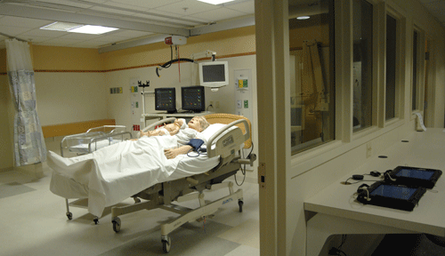 Mannikin in hospital bed for real life training purposes Mannikin in hospital bed for real life training purposes