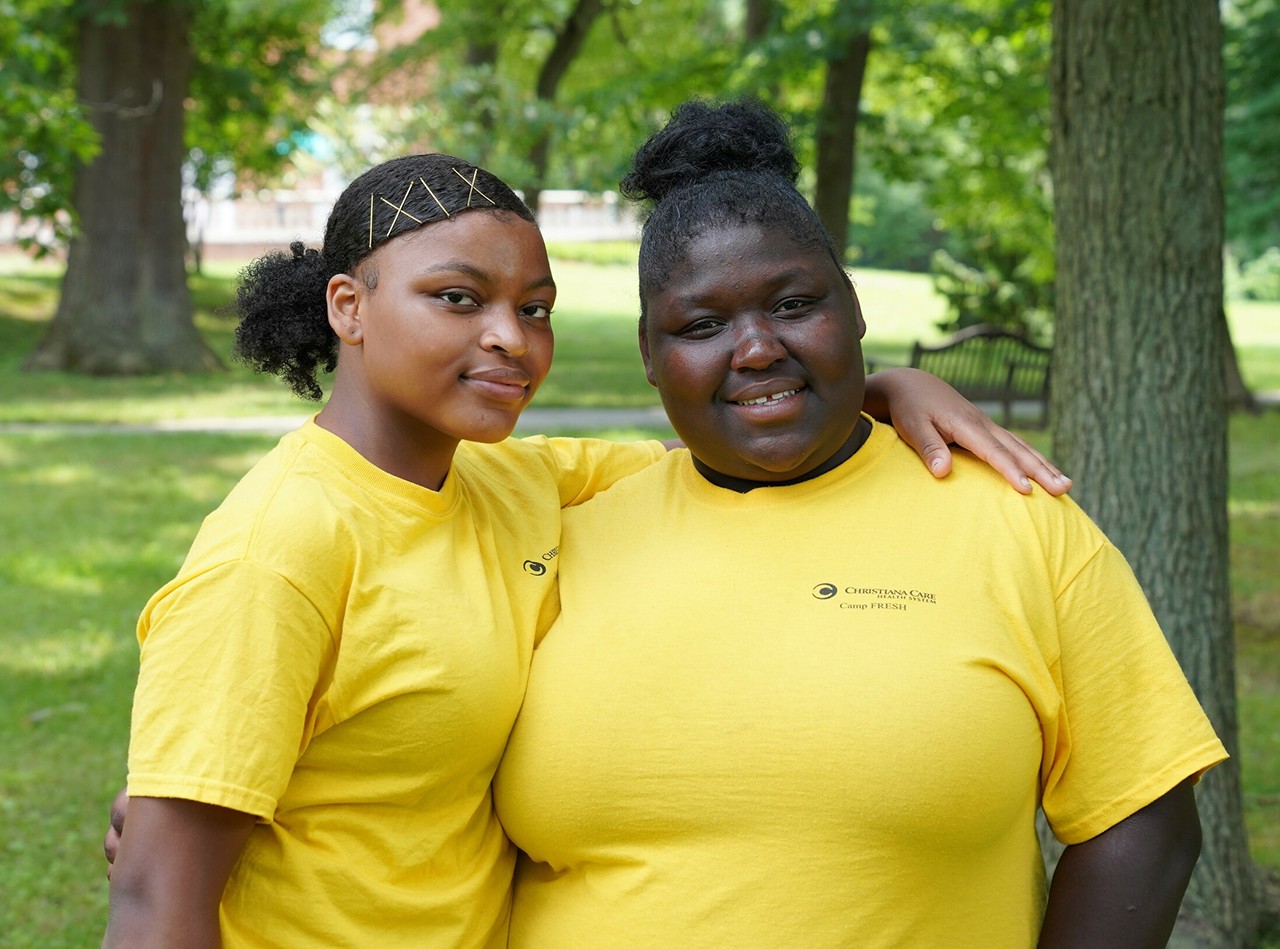 Two happy young friends from Camp FRESH Two happy young friends from Camp FRESH